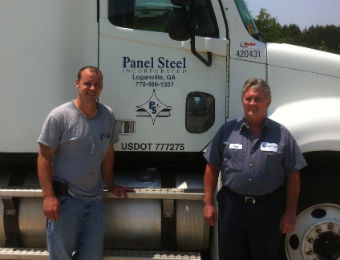 Panel Steel personnel by truck